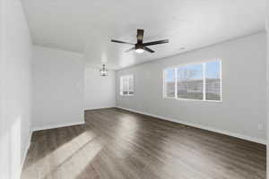 Empty room featuring light wood-type flooring and ceiling fan