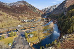 View of property location with a water and mountain view