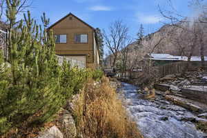 View of property exterior with a water view