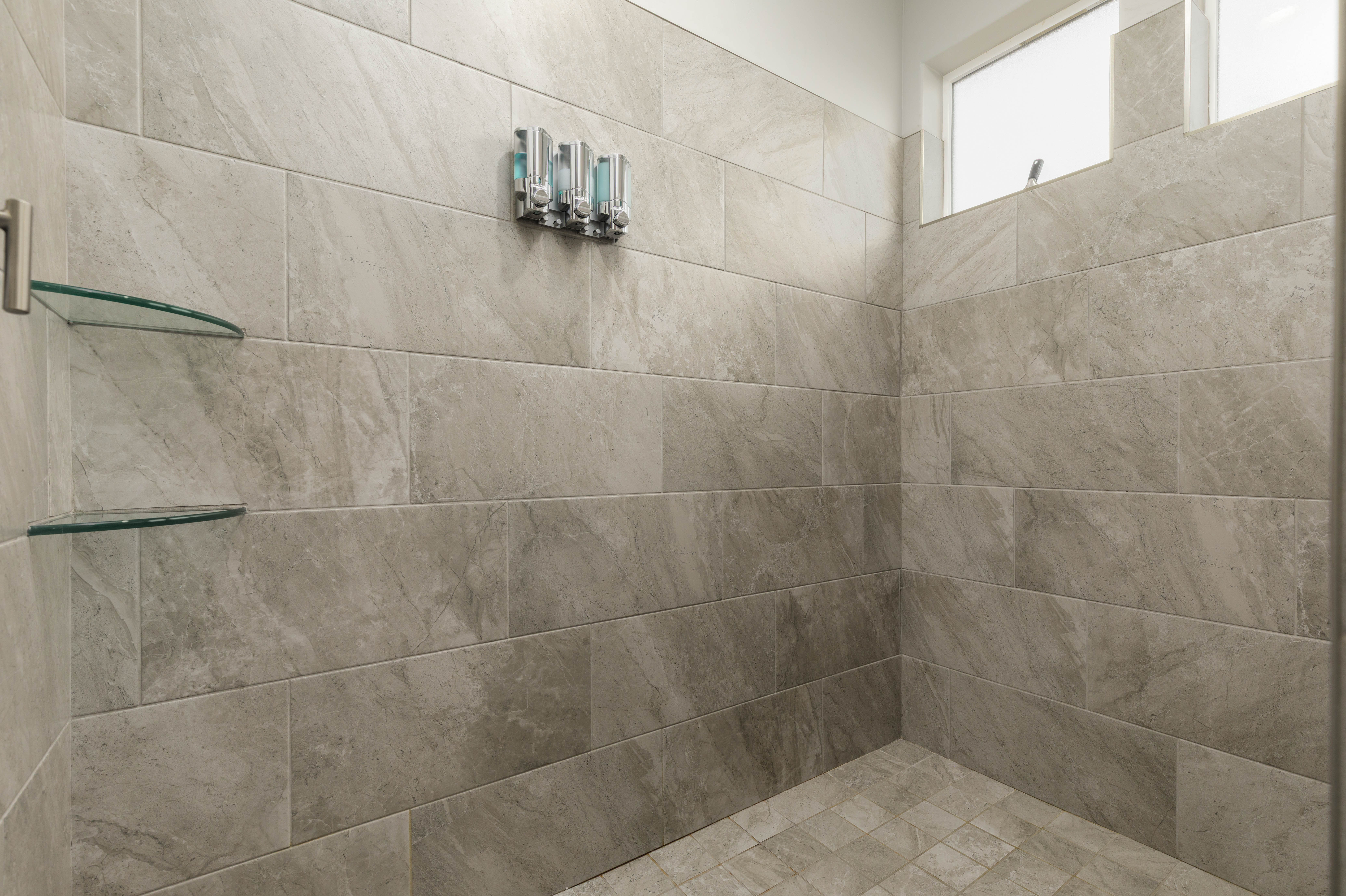 Primary bathroom with tiled shower
