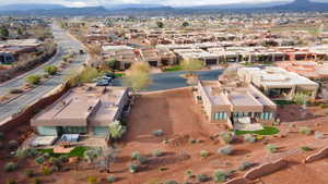 Aerial view of residential area featuring a mountain backdrop