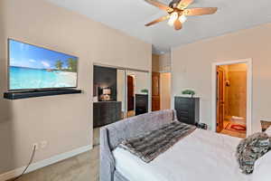 Bedroom featuring a closet, a ceiling fan, and carpet floors