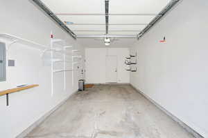 Garage featuring electric panel