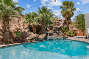 Outdoor pool featuring a patio