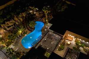 View of pool featuring a patio and a pergola
