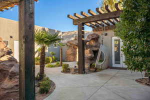 View of patio with a pergola