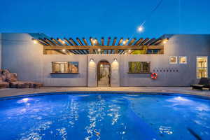 Outdoor pool with a patio area