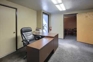 Office with a textured ceiling