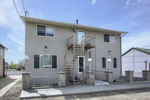 Traditional-style home featuring stairway