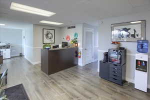 Reception with a paneled ceiling
