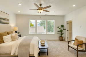 Bedroom with ceiling fan, carpet, recessed lighting, and a textured ceiling