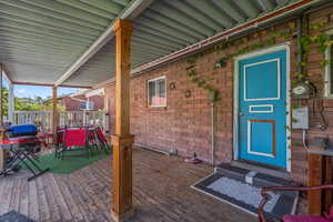 Property entrance featuring a deck