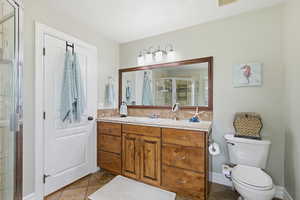 Full bath featuring vanity and a stall shower