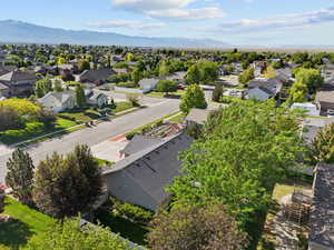 Aerial view of residential area with a mountainous background
