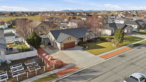 Aerial view of residential area featuring mountains
