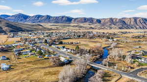 Aerial overview of property's location with a mountain backdrop to the east