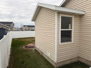 View of home's exterior with a fenced backyard
