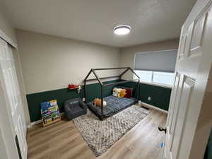Bedroom featuring light wood finished floors