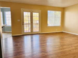 Empty room featuring light wood-style flooring