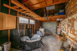 Garage featuring a garage door opener