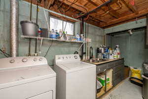 Laundry area featuring washer and clothes dryer