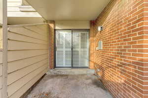 Outdoor patio with brick siding
