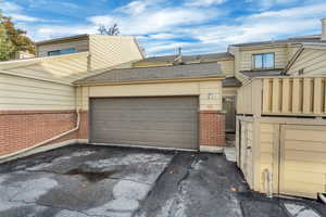 Garage featuring driveway