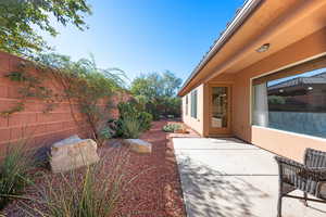 Fenced backyard featuring a patio area