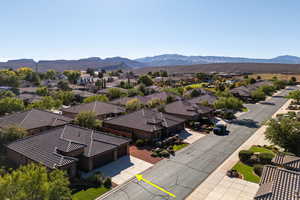 Aerial view of residential area with a mountain backdrop