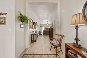 Hall featuring baseboards