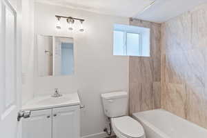 Full bathroom with vanity and  shower combination