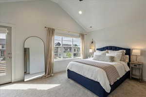 Carpeted bedroom featuring high vaulted ceiling, recessed lighting, and ceiling fan