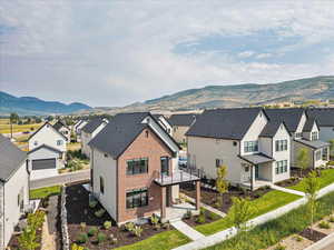 Mountain view featuring nearby suburban area