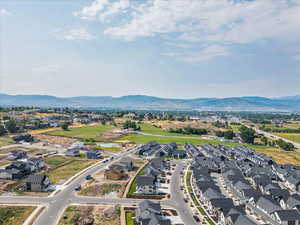 Aerial view of residential area with a mountain backdrop