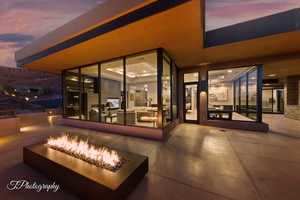 View of patio / terrace with a fire pit