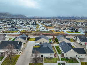 Aerial perspective of suburban area featuring mountains