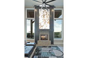 Detailed view of a stone fireplace and crown molding