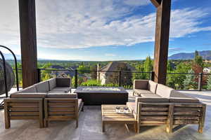 View of patio / terrace with a mountain view and an outdoor hangout area