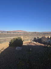 View of fenced backyard