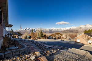 View of yard featuring a mountain view and a residential view