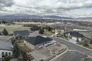 Aerial view of residential area with a mountainous background