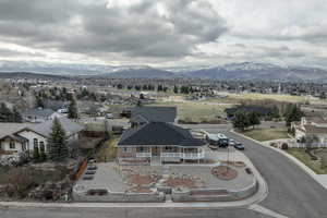 Aerial perspective of suburban area with a mountain backdrop