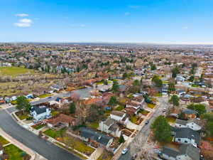 Aerial overview of property's location with nearby suburban area
