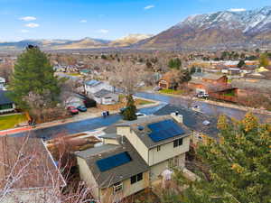 Aerial view of residential area featuring mountains