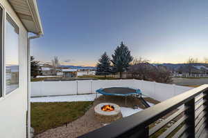 Balcony featuring an outdoor fire pit