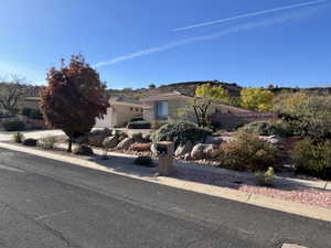 View of front of property featuring stucco siding