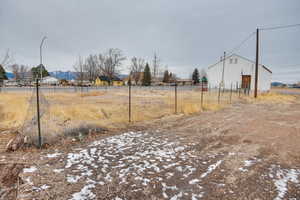 View of road with an outbuilding