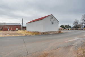 View of building exterior featuring a pole building
