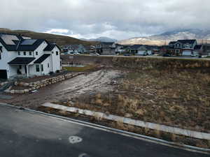 View of mountain background featuring nearby suburban area