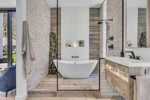 Bathroom with vanity and a freestanding bath